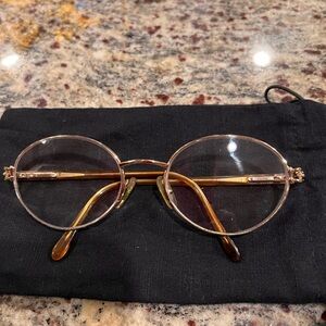 Gucci eye glasses, gold frame